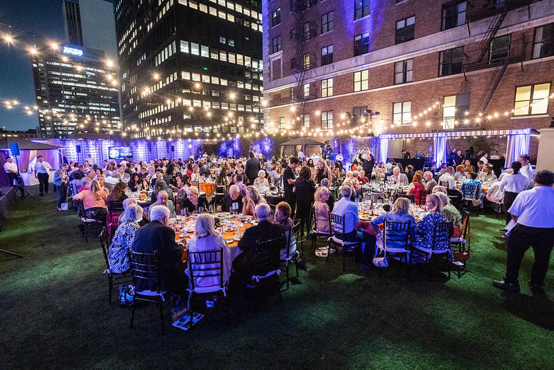 Wide shot of the Champions for Children Dinner atop The Great Lawn at Jonathan Club